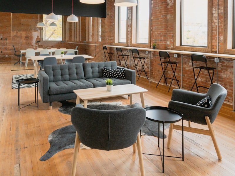 Warm finished lower-level living space with lounge seating
