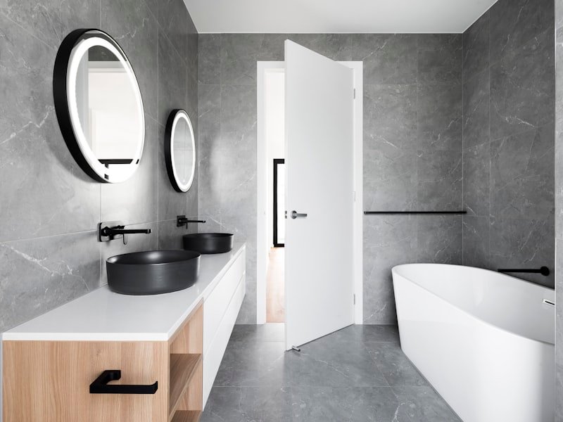 Modern bathroom with double vanity and walk-in shower